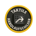 Handlaufschilder mit erhabener Schrift und Braille für barrierefreie Wegeführung in öffentlichen Gebäuden